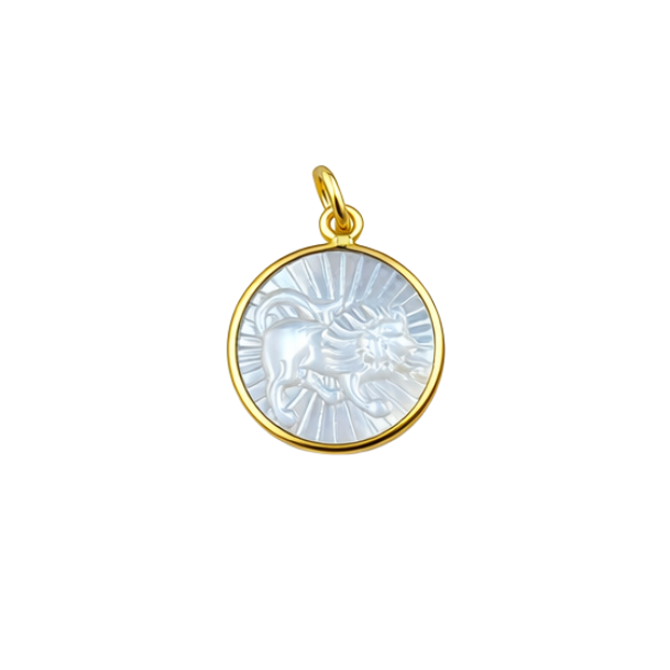 Gold pendant with a white circular design on a white background