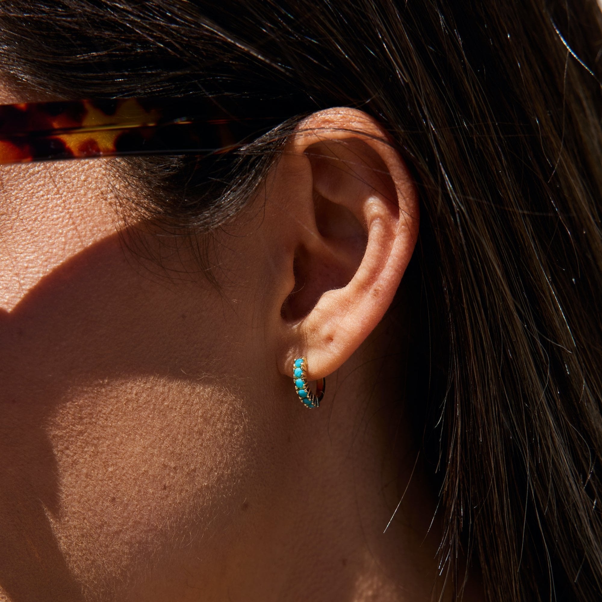 14K gold plated 925 sterling silver small hoops that "hug" your ear-lobe created with turquoise stone inlay.  minimalist trendy jewelry made in Vermont, perfect for casual wear, date night, work, weddings, gifting, or everyday wear.