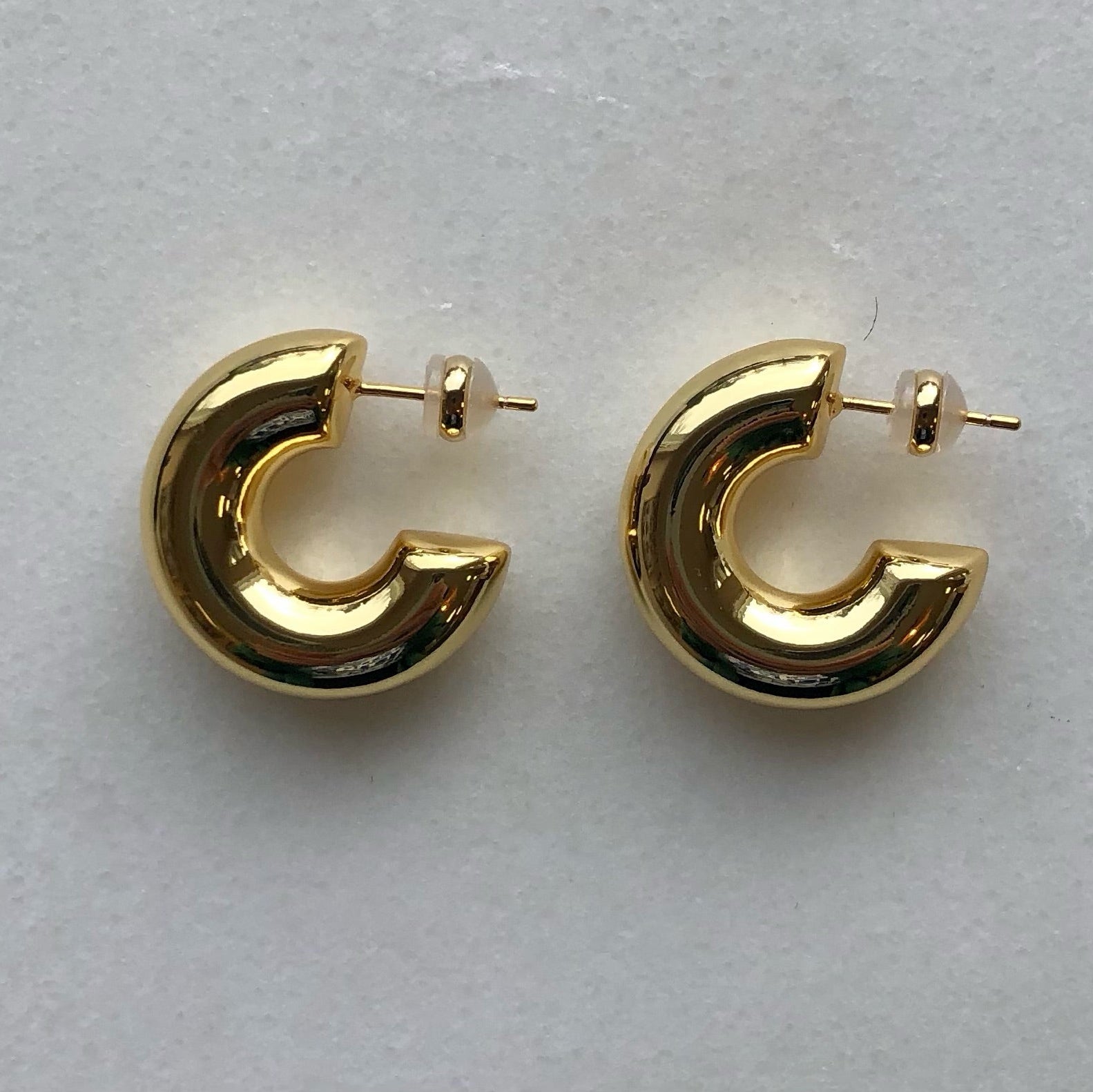 high polished  18K gold plated brass statement chunky bubble hoops in that are light and hollow – minimalist trendy jewelry made in Vermont, perfect for casual wear, date night, work, weddings, gifting, or everyday wear.