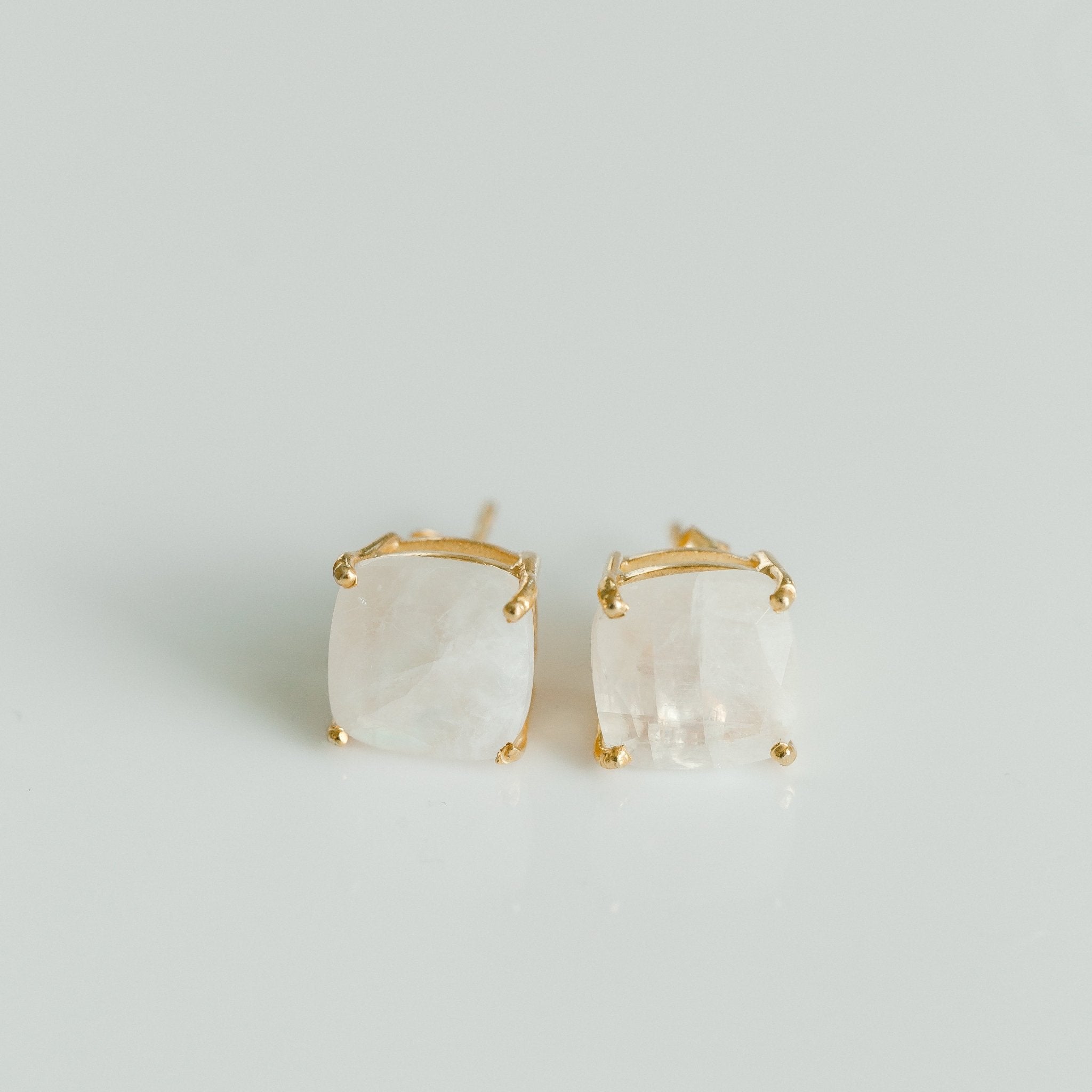 Emmy studs rainbow moonstone worn on ear – gold gemstone stud earrings Elli Parr