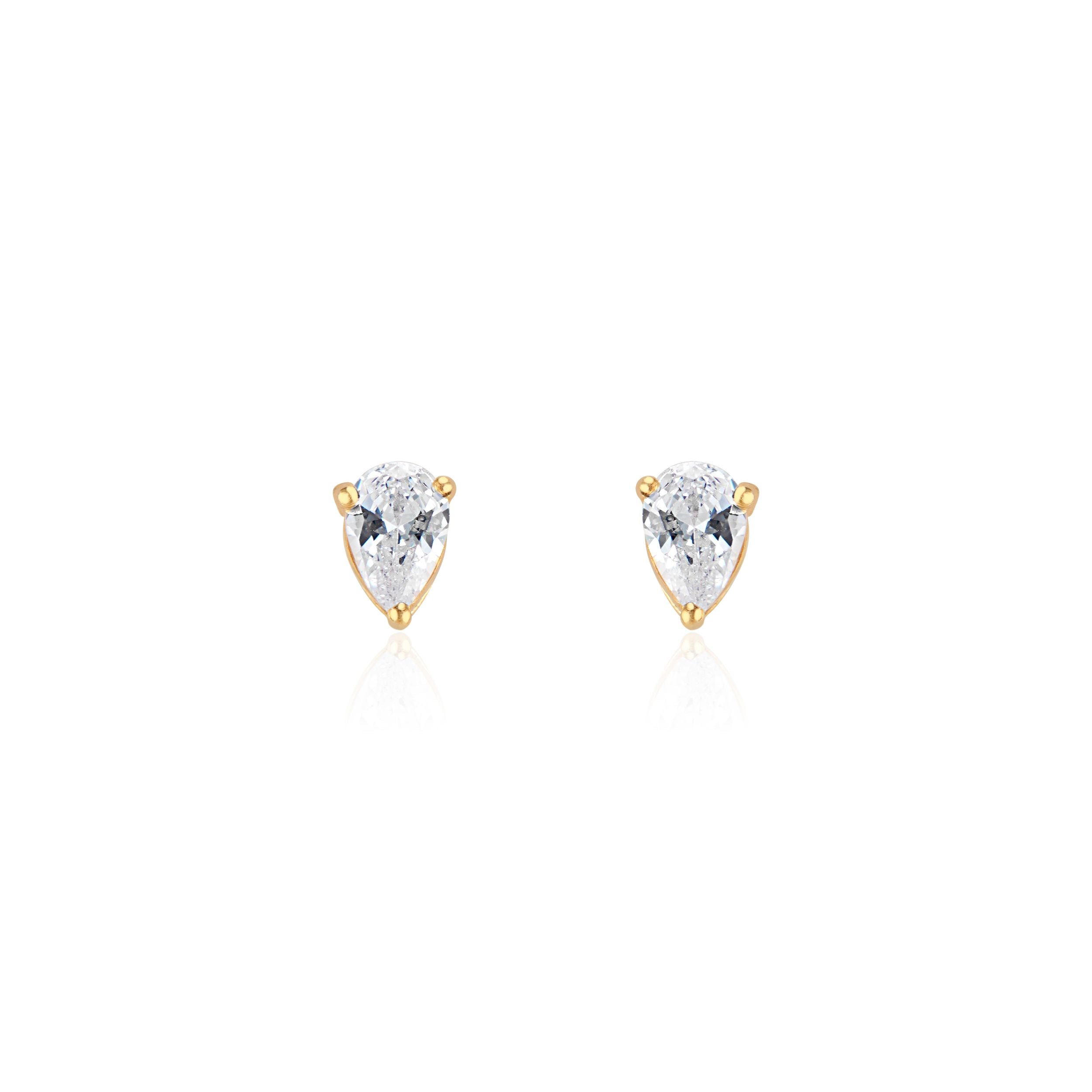 Close-up of elegant simulated diamond teardrop stud earrings set in 14K gold vermeil displayed on a neutral-toned fabric background. The polished simulated diamond gemstones are cut in a teardrop faceted shape, reflecting light for a subtle shine—handcrafted minimalist jewelry made in Vermont from Elli Parr.